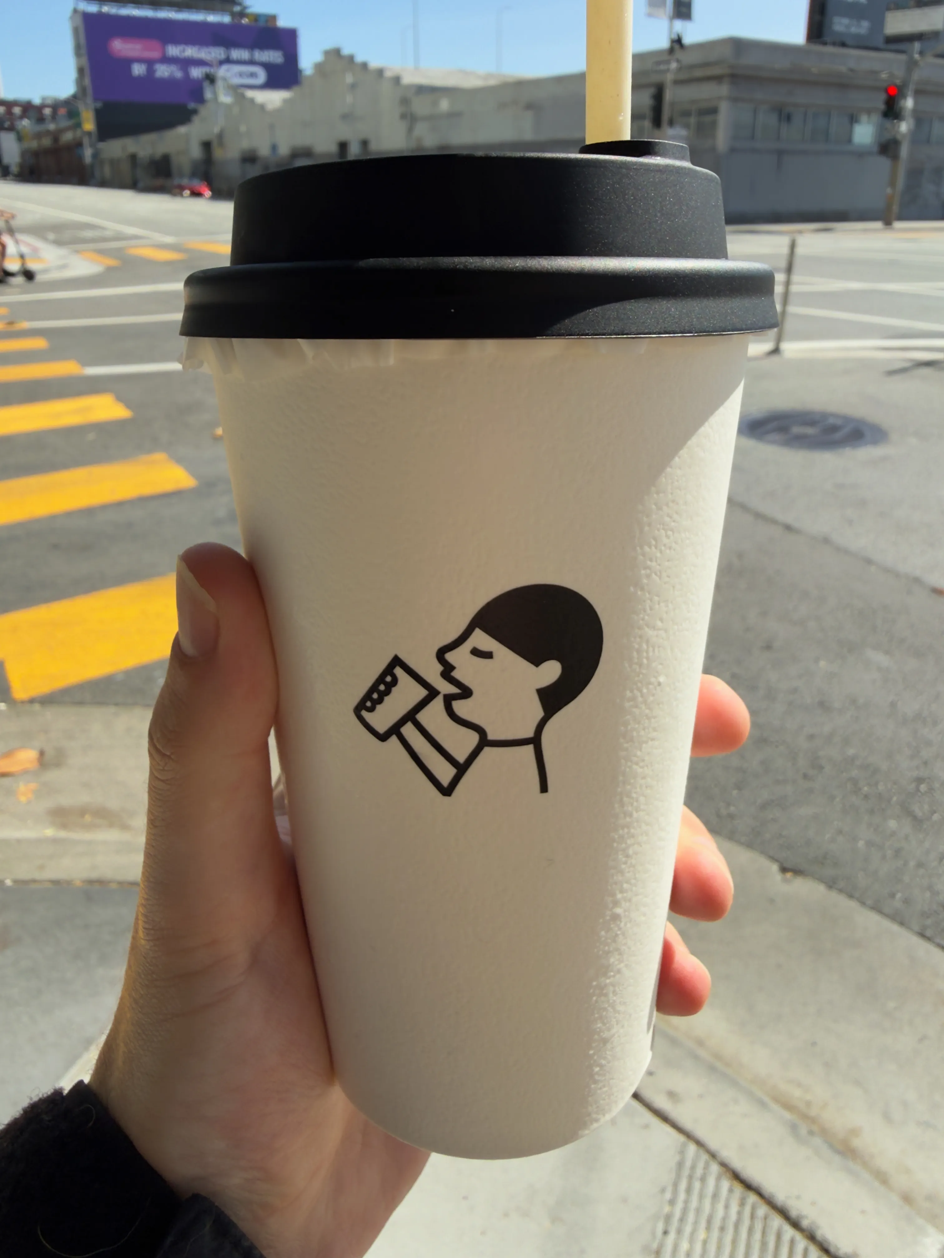 Front side of a tea cup from Heytea, showing their label Front side of a tea cup from Heytea, showing their label