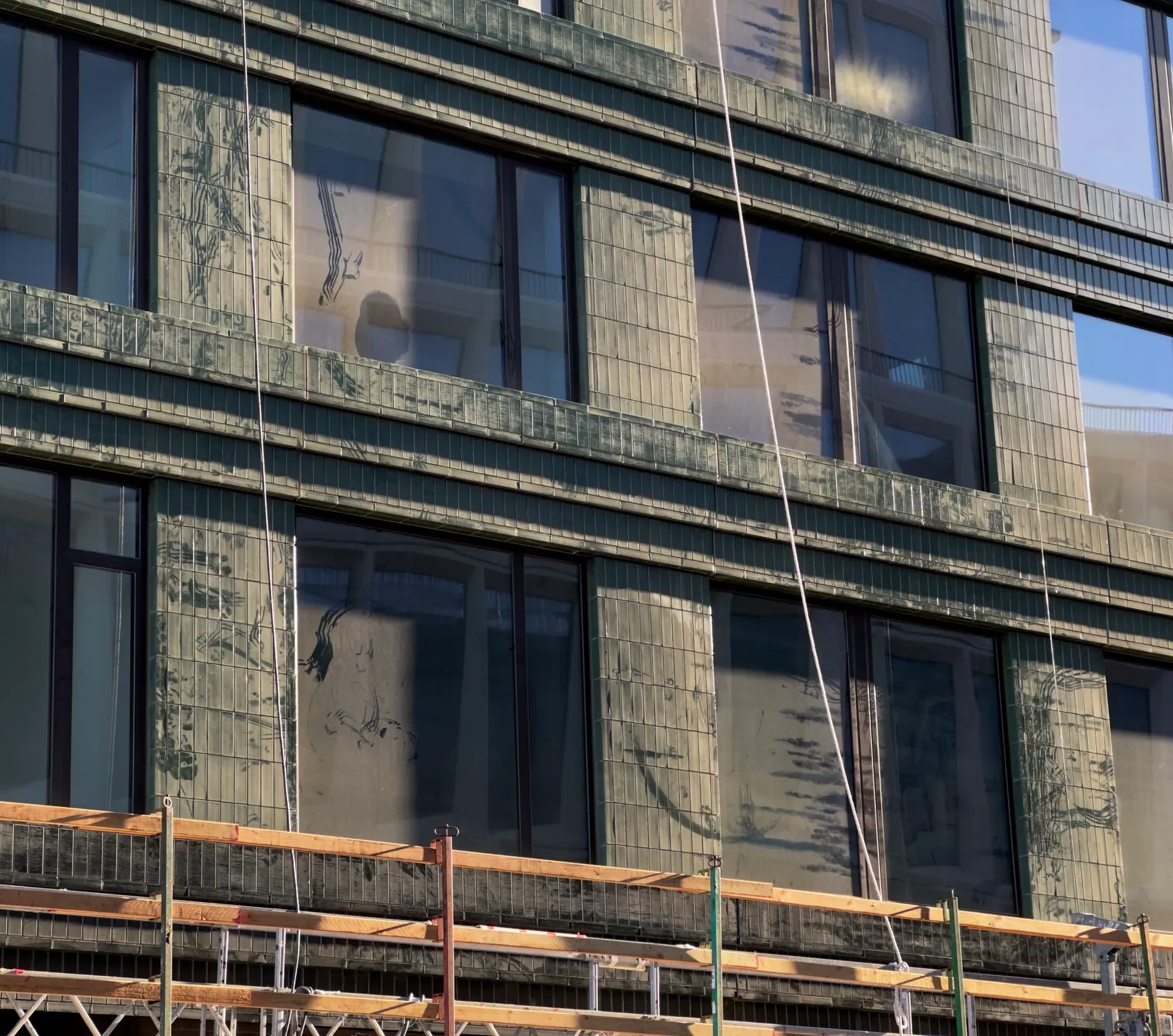 The facade of a new building under construction in Mission Bay