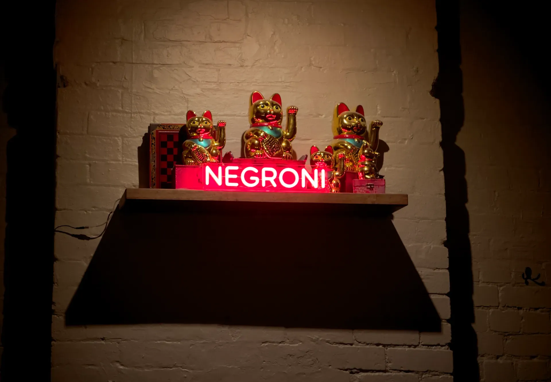Negroni cat decorations at a bar in Melbourne